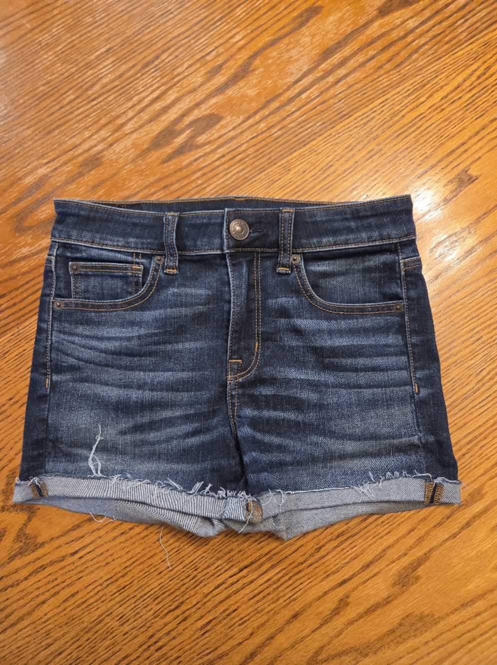 American Eagle Outfitters Dark Blue Denim Cropped Shorts with Frayed Hem